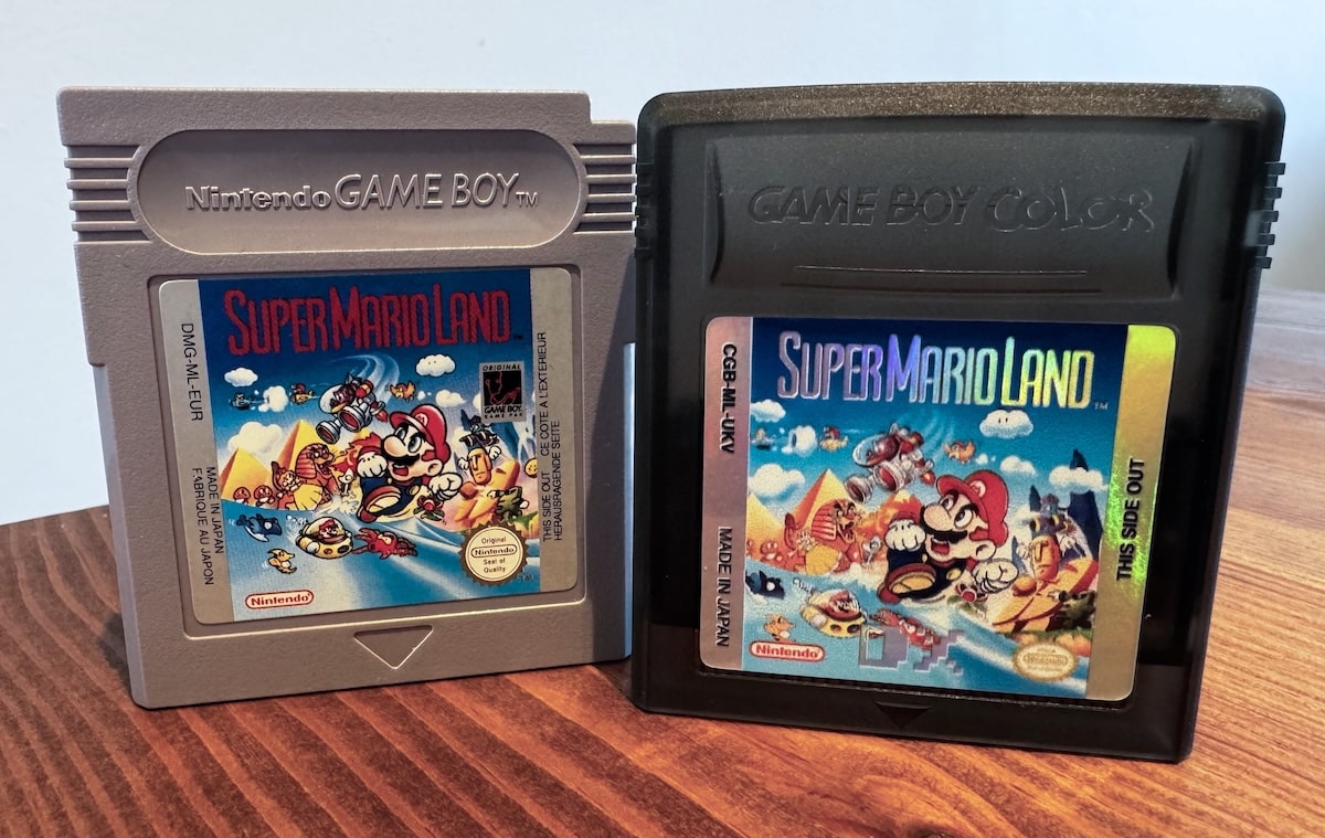 An original Super Mario Land cartridge, next to my custom replacement cartridge.