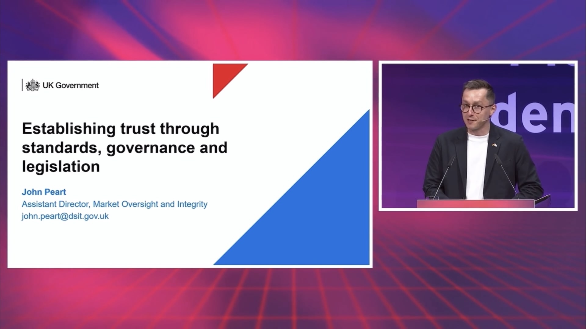 A screenshot of the live stream of my speech. A PowerPoint slide is on the left. I'm on the right.